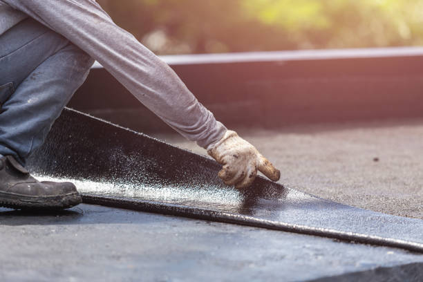 Professional Basement Waterproofing technician working in Shawnee, KS